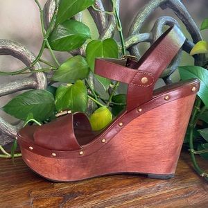 Tory Burch Leather and Wood Wedges.